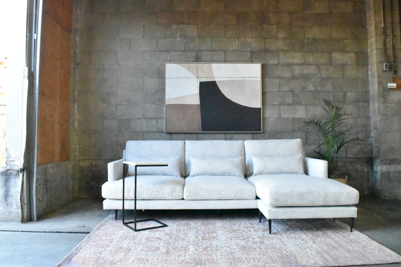 Long Shot Brick Wall L Shaped Couch Picture